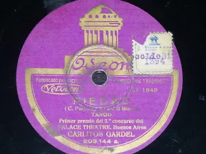 TANGO 78 rpm RECORD Odeon CARLOS GARDEL Tango PIEDAD / SCHWARZE ZÖPFE - Bild 1 von 1