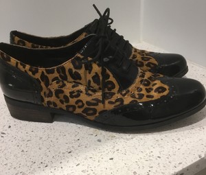 clarks leopard print brogues