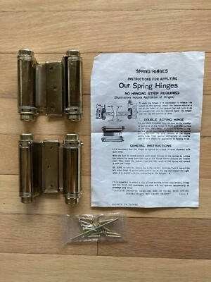 Juego de bisagras de resorte de doble acción de latón pulido de 3" puerta batiente para café/salón Foto 1 de 4