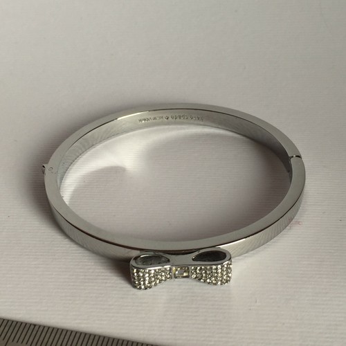 Bracciale Kate Spade New York fiocco cerniera argento diametro interno 2 3"