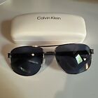 Calvin Klein Navigator Sunglasses CK19136S 200 Brown Frame Blue Lens 57 mm