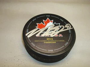 Disco de hockey de oro olímpico firmado por Matt Duchene equipo Canadá 2014 autografiado 1A - Imagen 1 de 2