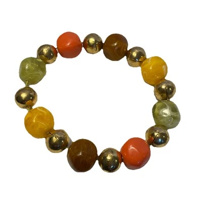 Pulsera elástica con cuentas naranja, marrón, amarillo y dorado Foto 1 de 4