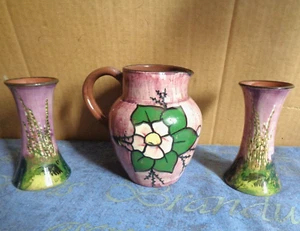 3 PURPLE GLAZE HAND PAINTED TORQUAY WARE ITEMS 2 MATCHING VASES & A JUG UNMARKED - Picture 1 of 12