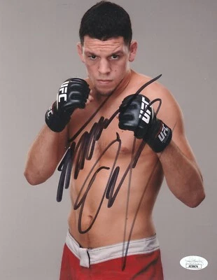 NATE DIAZ SIGNED 8X10 PHOTO W/PROOF JSA AUTHENTICATED A - Image 1 of 2