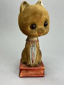 Vintage Flocked Kitty Cat Nodder Bobblehead Bank Thermometer Sitting on Red Book - Picture 1 of 8