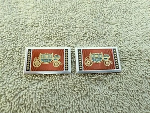 1965 - 66 CHEVY II NOVA DELUXE Interior Seat Belt Stage Coach RED Buckle Emblems - Picture 1 of 5