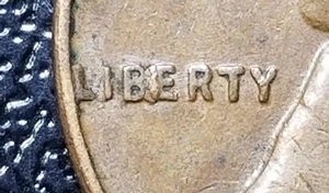 1957 MINT ERROR WHEAT CENT Penny ('BIE' IN LIBERTY) - Picture 1 of 4