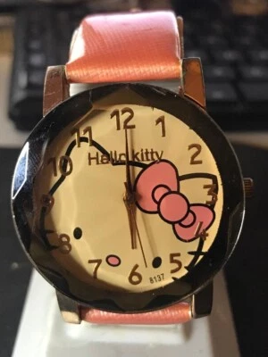 Reloj unisex Hello Kitty grande 40 mm caja dorada esfera marrón claro (#1144) Foto 1 de 4