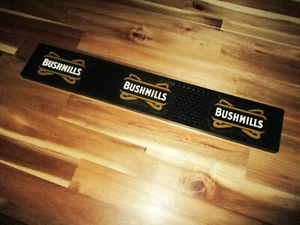 BUSHMILLS IRISH WHISKEY BAR TAPPETINO gomma binario fuoriuscita logo uomo grotta whisky NUOVO DI ZECCA - Foto 1 di 4