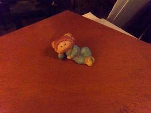  CABBAGE PATCH KIDS porcelain figurine  REDHEAD LYING ON SIDE - Picture 1 of 3