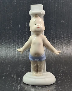 morena porcellana bimbo che si misura h 13 cm - Foto 1 di 3