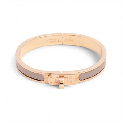 Brazalete Hermès Miniclick Kelly GP dorado x beige Foto 1 de 4