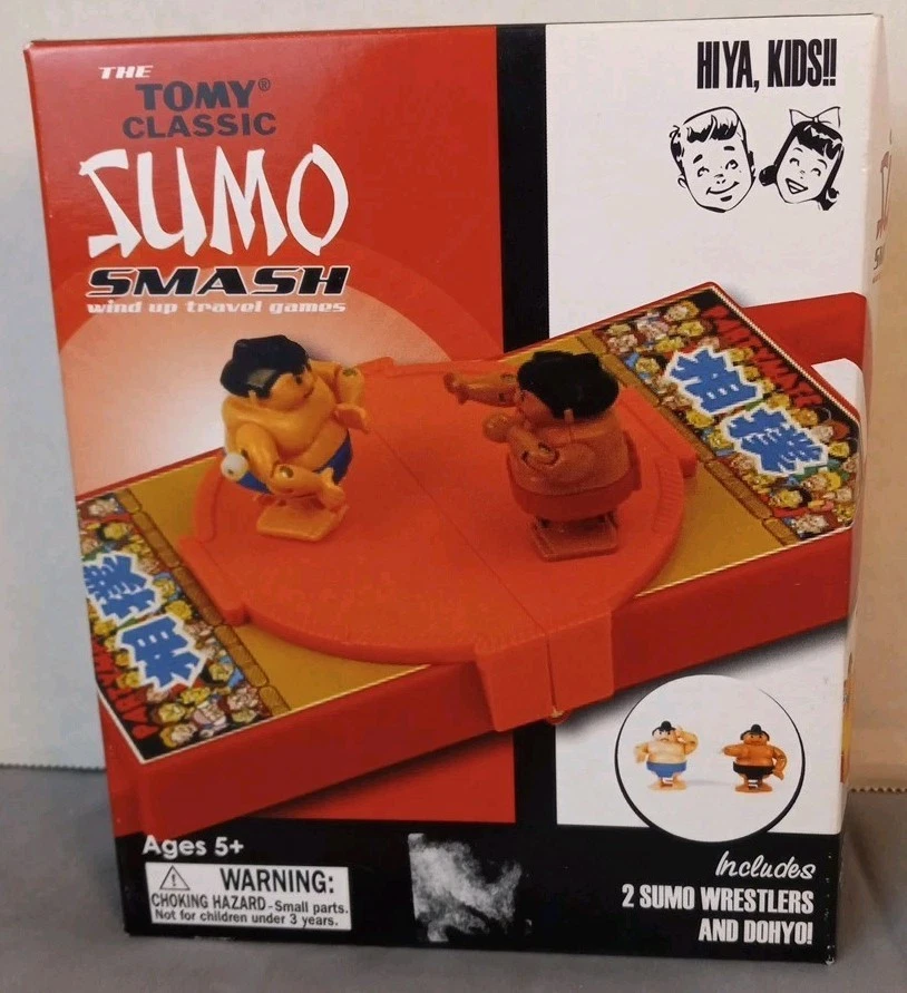 Tomy Classics Sumo Smash Wind Up Juego de Viaje 2009 Bazoo Global Nuevo con Caja Dañada Foto 1 de 4