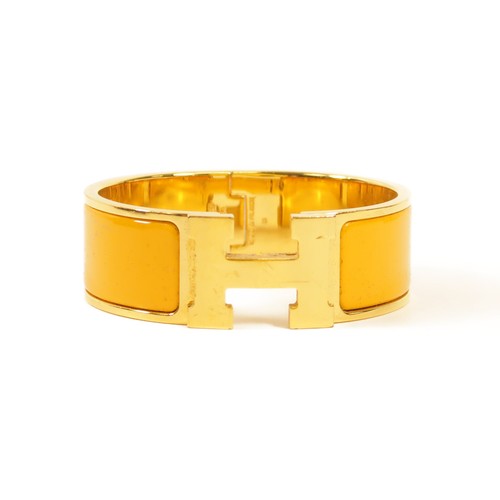 HERMÈS Bracciale HERMES GHW Clic Clac H Smalto Metallo Arancione