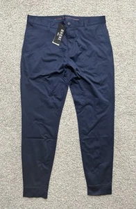 rhone commuter pants Cuffed ankle with zipper opening stretch Mens Sz 32 Blue - Picture 1 of 11