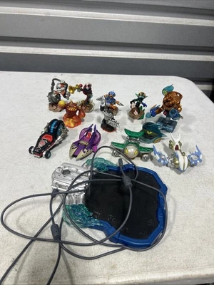 Lote de figuras y vehículos Skylanders lote mixto y base Foto 1 de 4