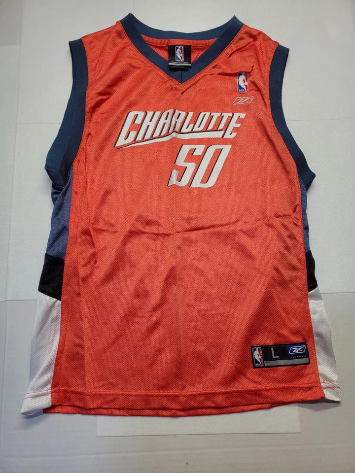Camiseta grande vintage Reebok NBA juvenil Charlotte Bobcats Emeka Okafor #50 naranja  Foto 1 de 4