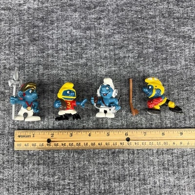 Lot of 4 Vintage Schleich Smurf Figures - Hockey, Football, Soldier, Headphones - Image 1 of 4