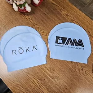 Lot Pack of 4 ROKA Swim Cap Ironman World all world athlete 2022 light Blue - Picture 1 of 5