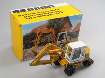 Escavatore idraulico Conrad 2833 Liebherr escavatore mobile A 310 escavatore 1:50 in confezione originale - Immagine 1 di 4
