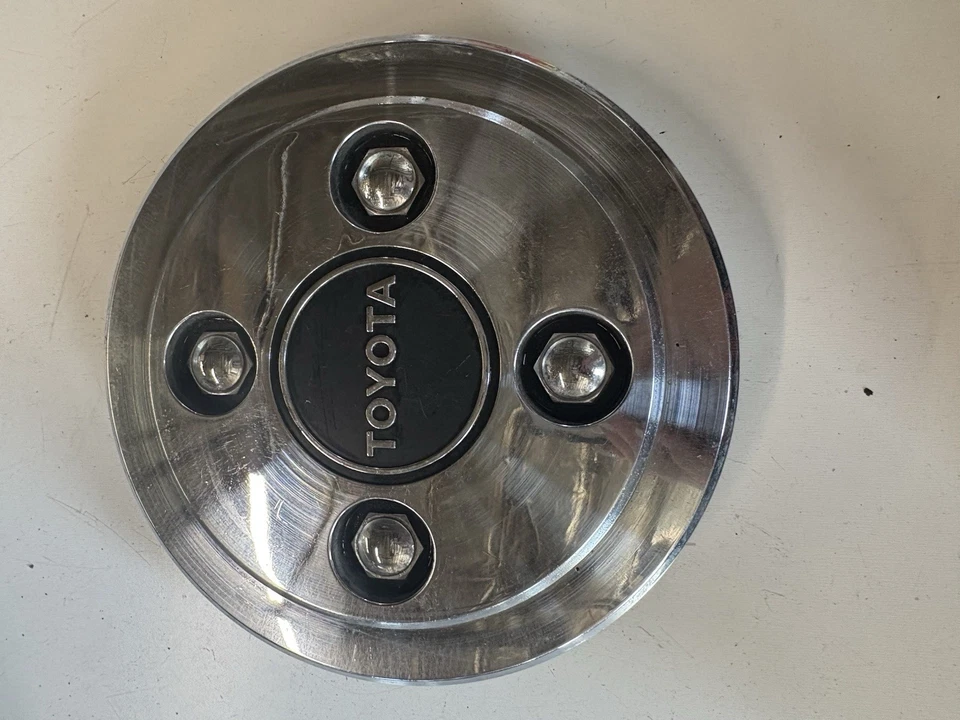 丰田 COROLLA TERCEL 原始设备制造商车轮中心盖加工抛光 1983 - 1987 716913PA — 第 1/2 张图片