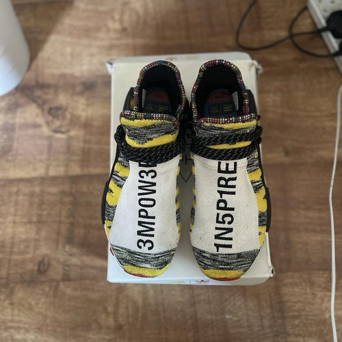 Adidas NMD Hu x Pharrell 'Confezione Solare Rosso'.