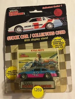 1989  #42 KYLE PETTY SERIES 1-RUBBER TIRE -PINK & BLUE  (OLD)  #1269             - Image 1 of 3