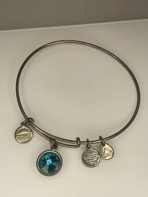 Brazalete Expandible Piedra Natal Alex and Ani Dijes Cristal Azul Dijes Plata Foto 1 de 3