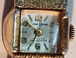 VINTAGE NEIMAN MARCUS  WOMEN'S GOLD TONE RECTANGLE WIND-UP WATCH WORKS - Picture 1 of 8