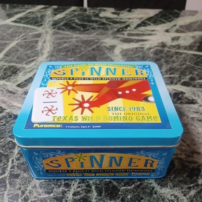 Spinner: Texas Wild Domino Game The Game of Wild Dominoes in Metal Tin NUEVO Foto 1 de 4
