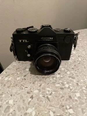 Cámara SLR de película focal de 35 mm TLR Kmart 1974 de colección hecha en Japón lente PETRI Foto 1 de 4