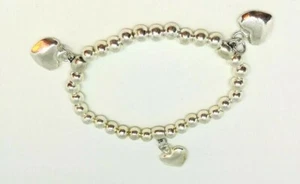 SCONTATO 10g: BRACCIALE-ELASTICO con CHARMS CUORE ARGENTO/ORO BIANCO,PREZIOSO! - Foto 1 di 2