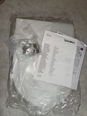 Asiento de inodoro alargado Duravit 0063390000 Starck 3 sin usar *GRIETA EN LA PARTE TRASERA DE LA TAPA* Foto 1 de 4