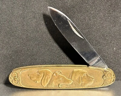 Navaja de bolsillo pequeña vintage Parker Brothers de latón para perro y caballo  Foto 1 de 4