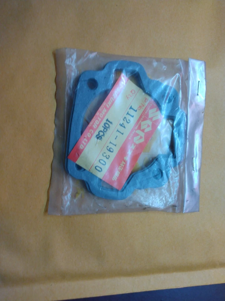 DEZ PEÇAS JUNTAS BASE CILINDRO SUZUKI OEM TM75 TS75 AC50 AS50 TS50 - Imagem 1 de 1