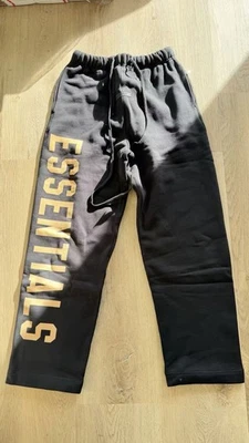 Pantalones deportivos Fear of God Essentials RELAXED SS24 negros talla XS (LETRA AMARILLA) Foto 1 de 2