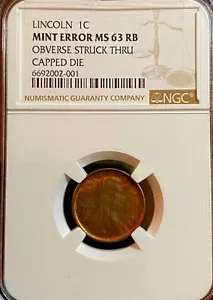 LINCOLN CENT (1C) OBVERSE STRUCK THRU CAPPED DIE-NGC MS 63 RB - RARE MINT ERROR - Picture 1 of 3