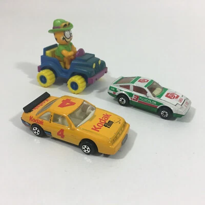Lot of 2 Vintage Kodak Fuji Die Cast Cars & Garfield Driving A Jeep - Image 1 of 4