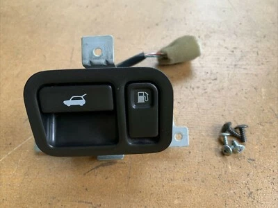 Interruptor de control de liberación del maletero de la puerta de combustible Infiniti QX4 2001-2003 negro OEM Foto 1 de 4