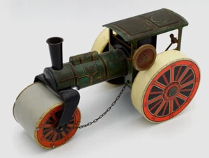 SCHIACCIASASSI A VAPORE GIOCO DI LATTA A CARICA D'EPOCA '30/40 MADE IN GERMANY - Imagen 1 de 11