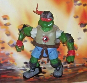 TMNT TEENAGE MUTANT NINJA TORTUGAS SUELTAS 2003 MOTOCICLISTA MICHELANGELO FIGURA PLAYMATES - Imagen 1 de 2