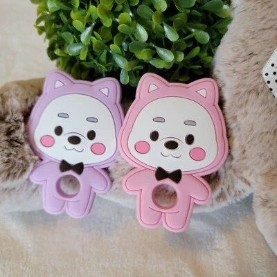 2 juguetes de dentición para bebés, silicona, rosa y púrpura  Foto 1 de 2