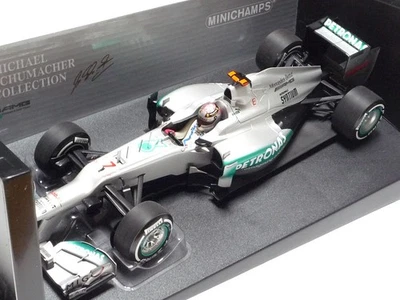 MINICHAMPS 1:18 MERCEDES W03 M. SCHUMACHER 300th GP BELGIUM GP 2012 - Image 1 of 4