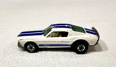 Mustang Stocker años 80 Hot Wheels blanco con rayas azules - ERROR - doble remache Foto 1 de 4