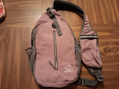 WATERFLY Purple Crossbody Sling Backpack Bag Travel Hiking Chest Bag Daypack - Image 1 of 3