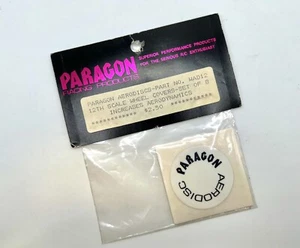 VINTAGE PARAGON WAD12 AERODISCS 1/12 SCALE RC CAR WHEEL COVERS. BLACK/WHITE. PK8 - Picture 1 of 2