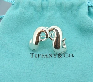 Tiffany &Co. Sterling Silver Infinity Omega Back Pierced Hoop Earrings - Picture 1 of 5