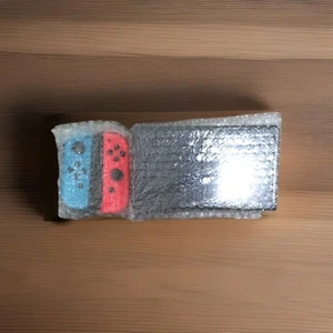 NEW Nintendo Switch OLED 64GB Neon Red Blue Joy-Con New ObO Never Been Played - Picture 1 of 3