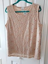 I am selling a lovely new lace sleeveless shell blouse